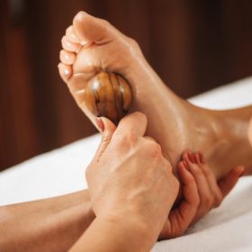 reflexology-foot-massage-with-wooden-massage-too-2021-08-28-14-14-06-utc (FILEminimizer)